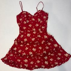 Red Floral Tiered Dress. Has Built In Padding And A Second Lining Under The Dress. Never Worn! Red Floral Print Mini Dress For Casual Occasions, Red Floral Print Sundress For Casual Wear, Fitted Red Floral Dress For Summer, Flirty Red Floral Print Dress, Red Floral Dress For Party, Red Sweetheart Neckline Dress For The Beach, Red Sweetheart Neckline Beach Dress, Red Sweetheart Neckline Dress For Beach, Red Lined Sundress