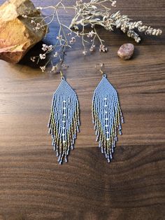 My mama made these!🥹 I am just selling these for her, we do collaborations as well but she gets 100% of the profit from her beaded creations💗 On hypoallergenic fishhook wires, this pair has a dusky cornflower blue, olive green and gleaming iris miyuki delica beads Indigenous Beaded Earrings, Antler Beads, Native Beaded Earrings, Beadwork Ideas, Native American Beaded Earrings, Miyuki Delica Beads, Native Beadwork, Native American Beading, Castle Rock