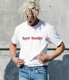 -Gildan 5000 Brand Shirts -Unisex Adult Sizing -Props used in photos are NOT included with purchase Check out this design on other products! Sweatshirts: https://www.etsy.com/listing/1435859000/rave-daddy-sweatshirt-festival?click_key=ec7a7c87e8a938bbd4b71de25f79f6abfb1975df%3A1435859000&click_sum=91105e3d&ref=shop_home_active_6&pro=1 Fiber Composition -Solid colors are 100% cotton; Heather colors are 50% cotton, 50% polyester (Sport Grey is 90% cotton, 10% polyester); Antique colors are 60% cot Surfer Men, Fitted T Shirt, Rave Shirts, Newquay Cornwall, Golf Men, Skate T Shirts, Simple Clothing, Festival T Shirts, Design Tshirt