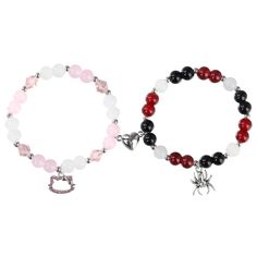 two bracelets with beads and charms on each one is red, white and black