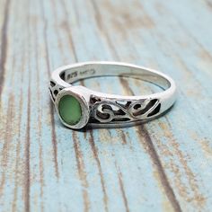 Beautiful Vintage Sterling Silver 925 Green Round Stone Celtic Ring, Size 7 1/2. Excellent vintage condition. Please note that all items are vintage, and not being new, will show varying degrees of signs of wear. All items will be packed in a jewelry bag or a box. I use padded envelopes to help protect jewelry during shipment. I will combine shipping if you are buying more than one item. Package tracking provided. I will make every effort to make your purchase a positive experience. Please gladly ask any questions!  All sales are final, however, if I have missed something of consequence in my description or the item arrives damaged or broken, please contact me and give me the opportunity to make things right. Celtic Ring, Celtic Rings, Jewelry Bag, Jewelry Bags, Stackable Rings, Vintage Sterling Silver, Silver 925, Jewelry Rings, Ring Size