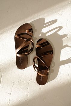 Rhodes Sandals Leather Toe Ring Sandals With Rubber Sole For Beach, Beach Toe Ring Sandals With Round Toe Leather Lining, Leather Toe Ring Sandals With Rubber Sole For Vacation, Brown Toe Post Footbed Sandals For Vacation, Brown Summer Toe Ring Sandals With Rubber Sole, Brown Toe Ring Sandals With Rubber Sole For Summer, Beach Toe Ring Sandals With Leather Lining, Beach Brown Toe Ring Sandals With Leather Sole, Vacation Brown Toe Ring Sandals With Rubber Sole