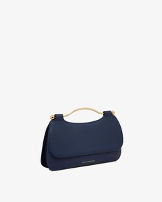 Strathberry - Harmony - Navy | Strathberry Royal Wardrobe, Music Bar, Leather Clutch Bag, Stylish Top, Top Handle Bags, Leather Clutch Bags, Leather Clutch, Designer Collection, Handbag Accessories