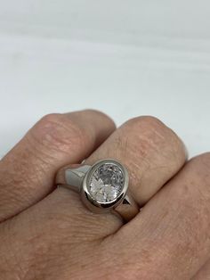 Vintage Engagement Ring clear CZ 925 Sterling Silver cocktail Sizes 6, 7, 8 Can be resized, my jeweler charges $10-$20 All rings are shipped free in the US in a nice gift box. Check out our over a THOUSAND great reviews Engraving is $4 per letter and is not always perfect depending on the piece. It can take a few days if the jeweler is busy. This is payable to Paypal Judithsltd@gmail.com Modern Diamond White Rings For Gifts, Modern Diamond Ring With Bezel Setting As Gift, Classic Cubic Zirconia Diamond Ring Stamped 925, Modern Silver Diamond Ring With Oval Shape, Classic Oval Clear Rings, Modern White Gold Crystal Ring For Gift, Modern Oval Crystal Ring For Gift, Modern Oval Crystal Ring Gift, Modern Diamond Ring With Vs Clarity As Gift