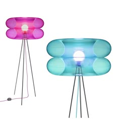 two different colored lamps sitting next to each other