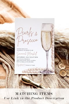 a card with pearls and champagne on it