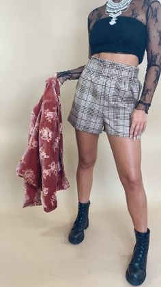 The Poise In Plaid Shorts in Camel/Burgundy is a stylish addition to your wardrobe. These plaid shorts offer a trendy, fashion-forward look. A chic and comfortable choice for various occasions. Plaid shorts with brown/burgundy Comes with an adjustable belt Magenta, brown, black, tan, and cream tones Fabric: 98% Polyester, 2% Spandex Imported Measurements: S: Inseam: 2.5" - M: Inseam: 2.75" - L: Inseam: 3" Model Specs: Emily is wearing a size small in the photo. How will this item fit you? Check Cream Tones, Vip Group, Viking Warrior, Everyday Chic, Plaid Shorts, Adjustable Belt, Chic Boutique, No Problem, Black Tan