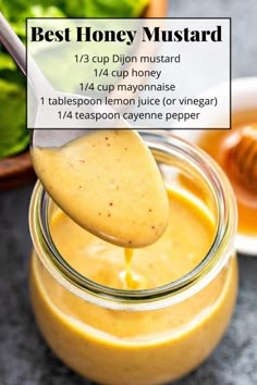 the best honey mustard recipe is in a mason jar with a spoon full of it