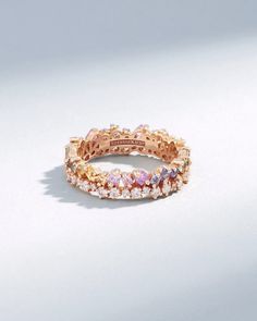 This exquisite eternity band showcases a captivating sequence of princess-cut pastel sapphires, complemented by the subtle radiance of round white diamonds. Set in rich 18-karat gold, the interplay of the gemstones create a stunning visual harmony. Details 18k rose gold 1.25 carat of princess-cut pastel sapphires 0.60 Colorful Wedding Band, Gemstone Wedding Band, Sapphire Eternity Band, Short Stack, Stacked Wedding Rings, Gemstone Wedding Rings, Dream Rings, Wrist Jewelry, Unique Wedding Bands