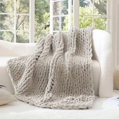 PRICES MAY VARY. Soft throw blanket: Our chunky knit blanket has the same appearance and soft touch as the chenille blanket. More importantly, this fabric drapes more luxuriously- it's lush, thick and tight! Our chunky blanket is the a great fashion-conscious choice for keeping warm in winter Multiple usage: Wrap yourself in our luxury hand knitted throw blankets while enjoying chill movies and lazy holidays. This chunky knit throw blanket is WOW just great! for relaxing at home, taking a nap, w Winter Decor Living Room, Knit Crochet Blanket, Cable Knit Crochet, After Christmas Winter Decor, Chunky Throw Blanket, Hand Knitted Throws, Knitted Throw Blanket, Cable Knit Throw Blanket, Chunky Blankets