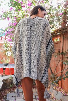 Multi-color crochet patterned poncho. One size fits most. Size: 42" x 30" Cuddle Season, Crochet Kimono, Boho Layering, Crochet Poncho Patterns, Kimono Pattern, Boho Fall, Poncho Sweater, Unique Crochet, Boho Crochet