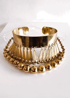 Vintage Gold Choker For Festivals, Gold Vintage Choker For Festivals, Unique Adjustable Metal Choker, Vintage Adjustable Choker Necklace, Festival Costume Jewelry Choker, Vintage Brass Choker Jewelry, Adjustable Vintage Metal Choker, Handmade Gold Dangle Choker, Gold Costume Jewelry For Festival