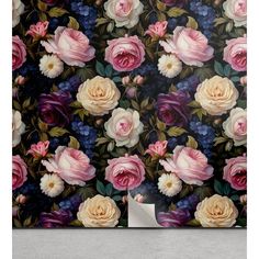 an abstract floral wallpaper with pink, white and purple flowers on a black background