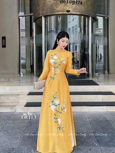 🌻 Stretchy level: 2/10 🌻Material: Lụa vân gỗ 🌻 The measurement of this ao dai (long dress) is in Vietnamese size (American size tends to be bigger for the same size). Please LOOK AT THE SIZE CHART CAREFULLY BEFORE ORDERING. There might have some chalk writings on the fabric due to making process. These marks can be washed away easily. 🌻No returns or exchanges Buyer can contact seller about any issues with an order. 🌸 Follow us Facebook/aodaiemily www.aodaiemily.com 💜 Thank you very much!💜 Traditional Ao Dai For Spring Party, Spring Party Traditional Ao Dai, Evening Sets With Floral Embroidery For Spring, Spring Evening Sets With Floral Embroidery, Elegant Floral Embellished Sets For Spring, Wedding Maxi Dress With Floral Applique, Spring Ao Dai For Banquets, Floral Print Embroidered Maxi Dress For Wedding, Long Sleeve Embroidered Gown For Spring