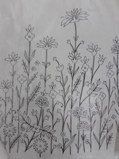 a drawing of some flowers on a piece of paper