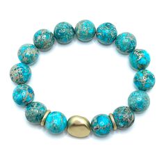 Turquoise Aqua Terra Jasper Matte Gold Nugget Stretch Bracelet Measures One Size Fits Most Made In The USA Style Number DB748 Aqua Terra, Gold Nugget, Aqua Turquoise, Matte Gold, Stretch Bracelet, Stretch Bracelets, Turquoise Bracelet, Turquoise Necklace, Made In The Usa