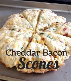 cheddar bacon scones on a baking sheet with the words cheddar bacon