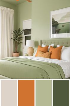 a bedroom with green walls and orange accents