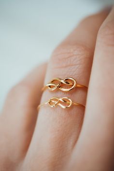 Women Owned + Operated | Hand Crafted To Order | Size Inclusive | Sustainably Made | High Quality Metals | Nickel-Free | Ethically Sourced A gorgeous alternative engagement ring or wedding band! The closed wire knot adds a bit of extra detail to this otherwise simple hammered stacking ring. This is one single length of 14K Gold metal that is knotted into a tight, closed knot and soldered around the back. This ring is a great alternative to a basic stacking ring! This listing is for ONE SINGLE RI Simple Golden Ring, Infinity Knot Ring, Friendship Ring, Alternative Engagement Ring, Infinity Knot, Single Ring, Friendship Rings, Promise Ring Gift, Stacking Ring Set