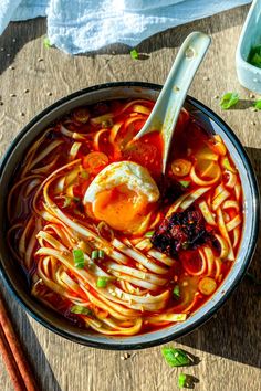 Garlic Miso Noodle Soup served in a bowl with a spoon, topped with green onions, a jammy egg and my homemade chili oil. On the side is a pair of wooden chopsticks and a white cloth. Japanese Noodles Soup, Ramen Noodle Recipes Bokchoy, Miso Paste Recipes, Miso Noodles, Miso Noodle Soup, Udon Noodles Recipe, Miso Recipe, Miso Soup Recipe, Noodles Soup