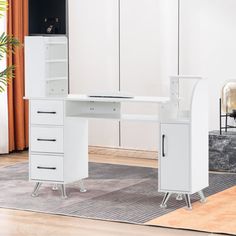 a white desk with two drawers and a cabinet in the middle on a carpeted floor