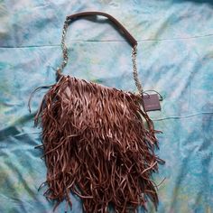 Bohemian Monserat De Luca Tan Suede Fringe Handbag. Great Condition, New With Tags. Black Lining With Zippered Pocket. Gold Chain Strap With Leather. Length 12" With Fringe 20". Width Side To Side 15". Gorgeous High Quality. Goat Leather. Evening Brown Pouch Hobo Bag, Brown Pouch Hobo Bag For Evening, Luxury Brown Hobo Bag For Evening, Brown Bucket Shoulder Bag, Designer Brown Hobo Bag For Evening, Brown Clutch Bag, Brown Pouch Shoulder Bag For Party, Party Bag With Removable Pouch In Brown, Evening Hobo Bag With Detachable Strap In Brown