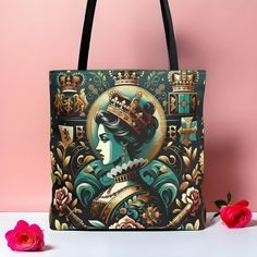 Elevate your style with our Crown Royal Tote Bag, featuring a beautifully detailed design inspired by British royalty. This elegant tote showcases an elegant queen surrounded by iconic symbols such as crowns, floral motifs, and heraldic emblems. Crafted from durable canvas with reinforced stitching, this spacious bag is perfect for shopping, work, travel, and more. Material: Durable canvas with reinforced stitching for long-lasting use Features: Large capacity interior, sturdy handles, and detai Queen Of Hearts Handbag, British Literature, Bridesmaid Tote Bags, Royal Design, Gift Bundles, Crown Royal, Elegant Accessories, British Royals, Fashion Lover