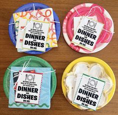 four plates with different types of dinner dishes on them, tied together and sitting on a table