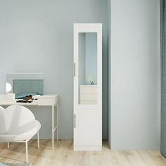 a bedroom with blue walls and white furniture