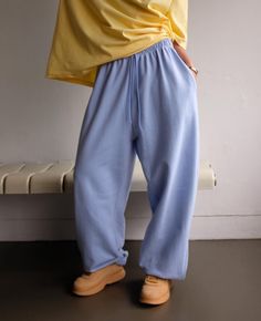 Wide leg. One Size. Side slant pockets Elastic waist. Elastic ankle  20% Polyester 80% Cotton Product Measurements: Waist 75cm / 29.5in Rise 40cm / 15.8in Length 104cm/40.9in Casual Cotton Harem Pants For Loungewear, Cotton Straight Sweatpants For Leisure, Comfortable Baggy Sweatpants With Ribbed Waistband, Cotton Wide Leg Joggers, Comfortable Wide Leg Cotton Joggers, Comfortable Wide-leg Cotton Joggers, Comfy Cotton Pants For Leisure, Baggy Comfortable Sweats With Pockets, Casual Cotton Wide-leg Joggers