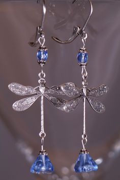 These Victorian style Dragonflies earrings are about 2 1/4 inches long. Accented with blue crystals and Czech floral beads. The Dragonflies are Sterling Silver Plated Brass. All orders come in a gift box or gift bag. Elegant Dragonfly Jewelry For Jewelry Making, Elegant Dragonfly Jewelry With Ear Wire, Elegant Dragonfly Earrings With Ear Wire, Nickel-free Blue Dragonfly Jewelry, Elegant Hypoallergenic Dragonfly Earrings, Jewelry Art Nouveau, Jewelry Victorian, Dragonfly Jewelry, Boho Trends