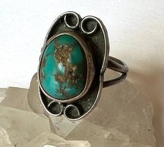 Vintage Turquoise Ring With Patina For Gift, Vintage Oval Ring With Patina, Vintage Turquoise Ring With Patina, Vintage Handmade Oval Turquoise Ring, Handmade Vintage Oval Turquoise Ring, Handmade Vintage Turquoise Oval Ring, Adjustable Vintage Patina Rings, Vintage Turquoise Ring With Large Stone, Antique Turquoise Ring With Patina For Gift