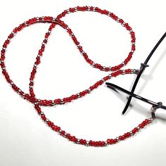 Enhance Your Eyewear With Our Handmade Red And Silver Beaded Eyeglass/Sunglasses Chain Holder, A Dazzling Accessory Designed For Both Style And Practicality. This Eyeglass/Sunglasses Holder Boasts A Variety Of Beads In Vibrant Reds And Shimmering Silver Tones, Accented With Red Faceted Glass Beads For An Extra Touch Of Sparkle. Complemented By Black Adjustable Eyeglass Holders, This 28-Inch Chain Is Made On Strong And Durable Beading Wire. Elevate Your Look With Eye-Catching Colors And A Versati Tortoise Glasses, Eyeglass Necklace, Armani Glasses, Sunglasses Chain, Tom Ford Glasses, Gold Glasses, Vision Glasses, Sunglasses Holder, Glasses Chains