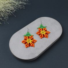 Brighten up your style with these stunning Beaded Flower Earrings! These Orange Flower Earrings are a perfect blend of elegance and charm, making them an ideal gift for your wife's birthday or a delightful surprise for Mother's Day.🎁 Handcrafted with care, these cute earrings feature intricate beaded designs that exude a unique boho vibe, perfect for anyone who loves original jewelry. Whether you're treating yourself or looking for the perfect present, these earrings are sure to bring a smile t Beaded Flower Earrings, Boho Beaded Earrings, Gift For Wife Birthday, Beaded Designs, Birthday Cute, Orange Earrings, Wife Birthday, Charm Making, Orange Flower