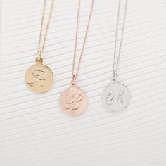 Luna Script Necklace in gold, rose gold, or silver. #scriptnecklace #tagnecklace #jewelry 14k Gold Round Pendant Necklace Gift, Tarnish Resistant Round Charm Necklace Gift, Round Tarnish-resistant Charm Necklace Gift, Dainty Engraved Medallion Necklace As Gift, 14k Gold Round Pendant Necklace As Gift For Her, Rose Gold Round Pendant Necklace As Gift For Her, 14k Gold Round Pendant Necklace For Her, Sterling Silver Tarnish Resistant Necklace For Gifts, Rose Gold Round Pendant Necklace For Her