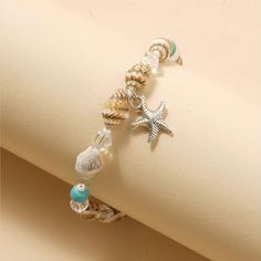 Product Overview Embrace the spirit of summer and enhance your beach attire with our Charming Starfish and Green Stone Beaded Anklet. Perfect for women who love to express their style effortlessly, this anklet combines elegance and playful charm in one beautiful accessory. Whether you're lounging by the sea or dancing at a beach party, this anklet adds a touch of glamour to any outfit. Key Features Material: High-quality zinc alloy that's both durable and lightweight. Design: Adorned with a capt