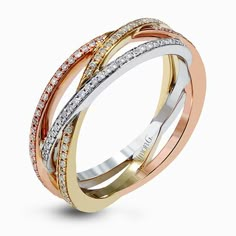 Featuring three intertwined bands of rose, white, and yellow gold, this contemporary Simon G. ring is inset with .41 ctw of round cut white diamonds. Contemporary Ring, Right Hand Rings, Hand Ring, Bling Rings, Contemporary Jewellery, White Diamonds, Right Hand, Bling Bling, Diamond Rings