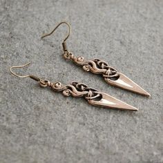 Delicate earrings made in Urnes style The body is made of bronze Earwires are antiallergic Not heavy - 5g is the wage of the pair Total length: 60 mm / 2.4 in Ideal both, as addition to Viking or Slav historical outfit, as well as everyday fashion jewelry ✩ ✩ ✩ ✩ ✩ Visit us on FB @barbariann.jewelry and Instagram @barbariann_jewelry where you can see snapshots from our workshop ✩ ✩ ✩ ✩ ✩ Bronze Viking Jewelry For Ceremonial Occasions, Bronze Brass Jewelry For Larp, Medieval Handmade Bronze Jewelry, Medieval Bronze Jewelry For Larp, Handmade Viking Style Bronze Jewelry, Urnes Style, Viking Earrings, Antique Bronze Jewelry, Viking Pendant