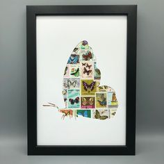 a black frame holds a collage of butterflies