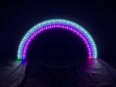 a circular light up arch in the dark