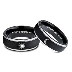 two black and white rings with the words score jewelry written on each one in silver