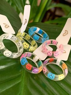 Simple and cute, dainty rings that are lightweight and super comfortable! I love colorful and random rings, so I thought I should bring my love for random stuff to you guys! Pulseras Kandi, Hand Jewelry Rings, Funky Rings, Aesthetic Rings, Rings Etsy, Dainty Rings, North Las Vegas, Indie Jewelry, Smiley Faces