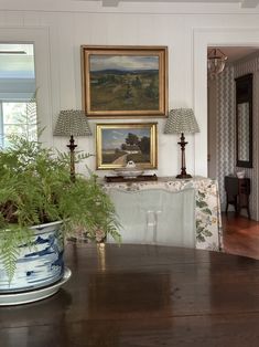 a dining room with a table and chairs