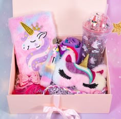 a pink box filled with lots of toys