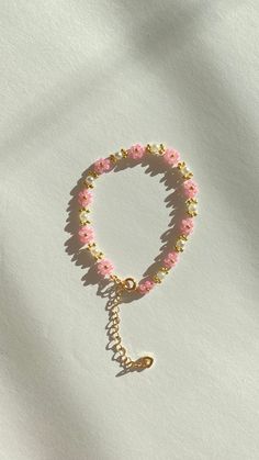 'Spring Blossom Bracelet' - Pink Bracelet - The Bracelet is delicately strung on a durable thread that ensure both comfort and Durability.  Bracelets comes with the extension of 7cm, you can adjust the size as well.  - High quality fresh water pearl and seed bead. - Size of the Product:              Small : (15 - 16) cm             Medium : (17 - 18) cm             Large : (19 - 20) cm For any questions, please email me to theranas006@gmail.com🤍🤍 Please follow us on instagram @therbyrana to se Dainty Spring Beaded Bracelets, Delicate Beaded Jewelry For Spring, Gold Round Beads Bracelets For Spring, Gold Round Beads Bracelet For Spring, Dainty Beaded Bracelets With Round Beads For Spring, Spring Gold Bracelets With Round Beads, Dainty Flower Beaded Bracelets For Spring, Dainty Adjustable Jewelry For Spring, Gold Bracelets With Round Beads For Spring