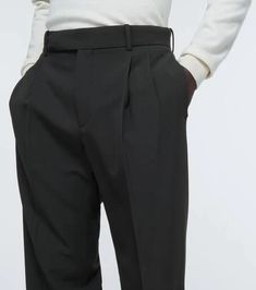 The sleek Jasper pleated virgin wool pants offer smart style and impeccable Italian craftsmanship. Made of ultra-soft 100% virgin wool in a mid-weight straight leg design, they feature belt loops, zip fly with button closure, and side and back slip pockets for everyday wear. At a true to size fit that flatters all proportions, they pair easily with any shirt or sweater for a polished look. Enjoy free worldwide shipping and worry-free returns within 30 days.