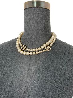 We the ity of this rare Chanel CC Logo Timeless Classic Faux Pearl Necklace crafted from graduated?ÿwhite faux pearls?ÿand gold-tone hardware. Featuring signature 'CC' encrusted logo's and a lobster clasp closure. Wear this?ÿversatile necklace long or doubled! Condition:?ÿExcellent.?ÿOverall like-new. All pearls and encrusted 'CC' logos are in-tact and perfect. Graduating faux pearls?ÿ Gold-tone metal hardware 17'' drop?ÿ Total?ÿlength, 34'' 'CC' logos, 0.75'' Shopping Chanel, Necklace Craft, Ball Pendant, Faux Pearl Necklace, Prada Crossbody Bag, Necklace Long, Timeless Handbag, Cc Logo, Girl Backpacks