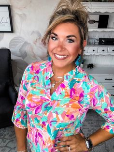 Some tops make a subtle statement. This isn’t one of them. While its notched V-neck and 3/4 sleeves keep things chic. Pair this top with your favorite distressed denim for a laid-back boho vibe or a structured blazer for a splash of color in the office. However you style it, one thing’s for sure: in this scene-stealing top, you’ll be the center of attention. After all, when you’ve got a print this unapologetic and a silhouette this flattering, the only option is to make a memorable impression. F Spring Top With Notched Neckline For Day Out, Chic Spring Top With Notched Neckline, Chic Tops With Notched Neckline For Spring, Chic Split Neck Top For Brunch, Trendy Tops With 3/4 Sleeves For Brunch, Spring Split Neck Blouse For Brunch, Chic Multicolor Top With Split Neck, Chic Multicolor Split Neck Tops, Multicolor Split Neck Top For Spring