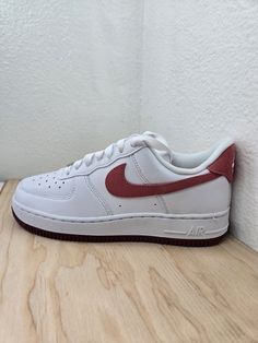 Elevate your activewear game with these stylish Nike Air Force 1 sneakers. Designed with a low top shoe shaft style and lace-up closure, these sneakers are perfect for casual wear, workwear, and athletic activities alike. The upper material is made of high-quality leather, while the lining material is also leather, providing a comfortable and breathable fit. The cushioned and supportive features of these sneakers make them suitable for a variety of activities, including beach volleyball, cycling, boxing, baseball, bowling, cross training, CrossFit, basketball, bodybuilding, cheerleading, and running. The colorful theme of these sneakers adds a touch of style to any outfit, making them a versatile addition to your wardrobe. Air Force 1 Sneakers, Nike Air Force 1 07, Beach Volleyball, Outfit Making, Cross Training, Nike Air Force 1, Top Shoes, Air Force 1, High Quality Leather