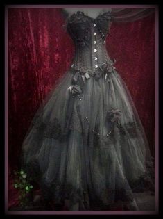 Unique hand made bridal or ballgown created from mounds of black tulle netting with rows of venetian guipure laces hand made organza roses and trails of crystals. This has mounds of  tulle and is cinched up in front with jet black beads and handmade roses. . It has a wonderful old world look and feel to it. This stunning gown is constructed with 2 separate pieces. The huge ballgown skirt and the heavily steel boned corset which is very heavily adorned with unique braids and venetian laces as well as hand made organza and satin roses.  This is truly a stunning dreamlike gown . I have elasticated the waist so that it will fit a lot of waist sizes. This will be created in your size after you have supply me with all measurements.To be made to order so may take up to 10 weeks ....Please message Charcoal Wedding, Halloween Chic, Steampunk Fantasy, Gothic Wedding Dress, Lovely Fashion, Altered Couture, Ball Gown Skirt, Gothic Steampunk, Black Tulle